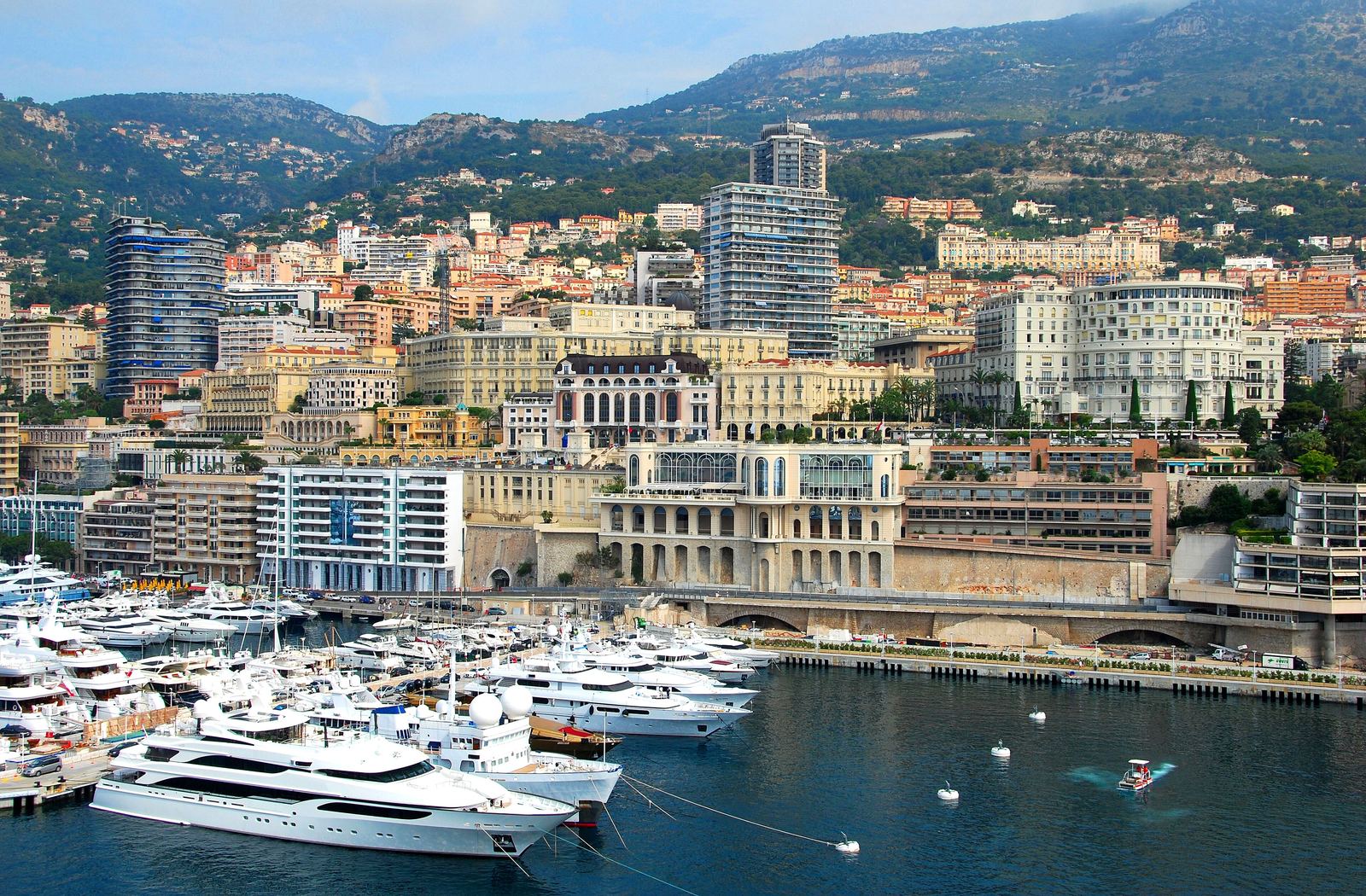 Superyachts moored in Port Hercule below the Monte-Carlo skyline