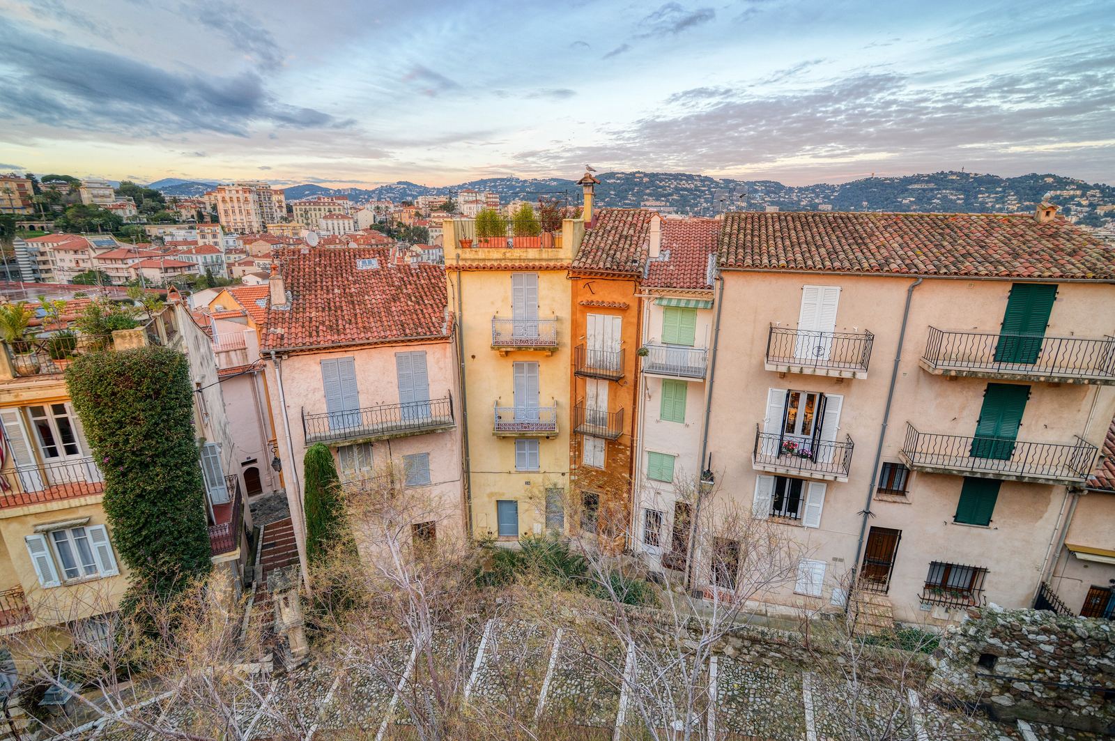 Terracotta rooftops of Le Suquet, the old town of Cannes, at golden hour