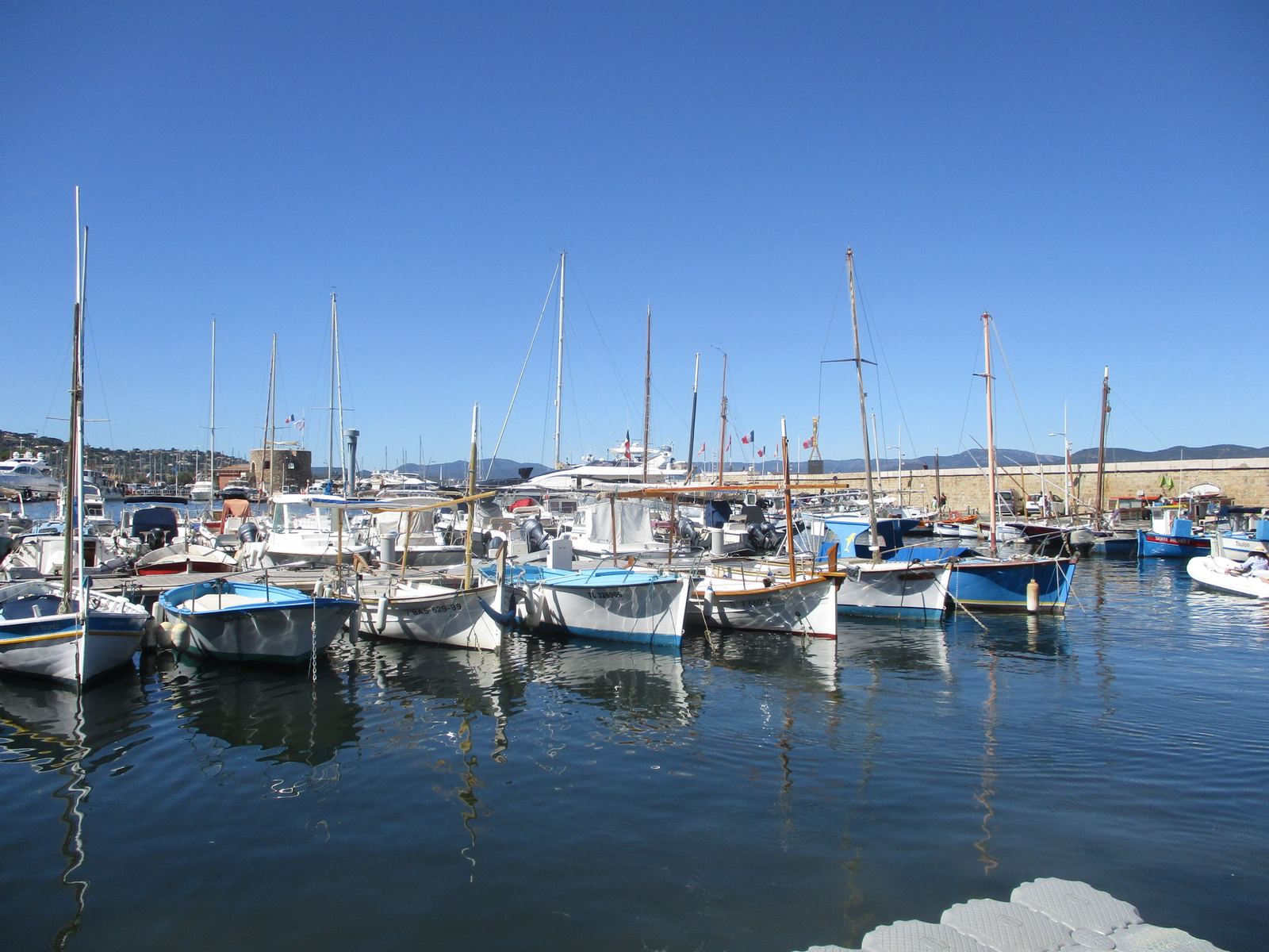 Traditional wooden pointu fishing boats in the old port of Saint-Tropez